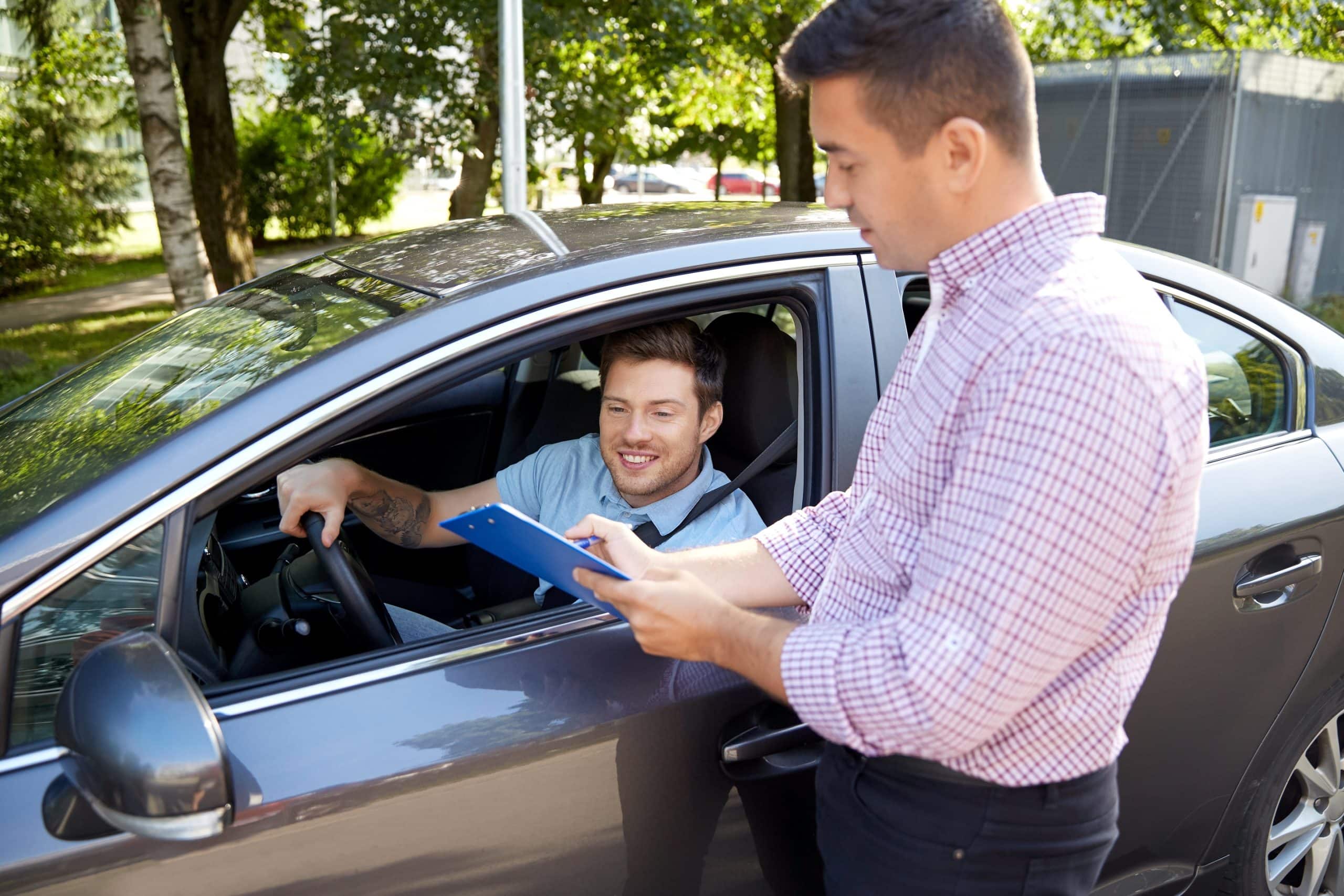 Student and driving instructor